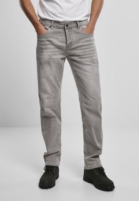 Ljusgrå slitna jeans